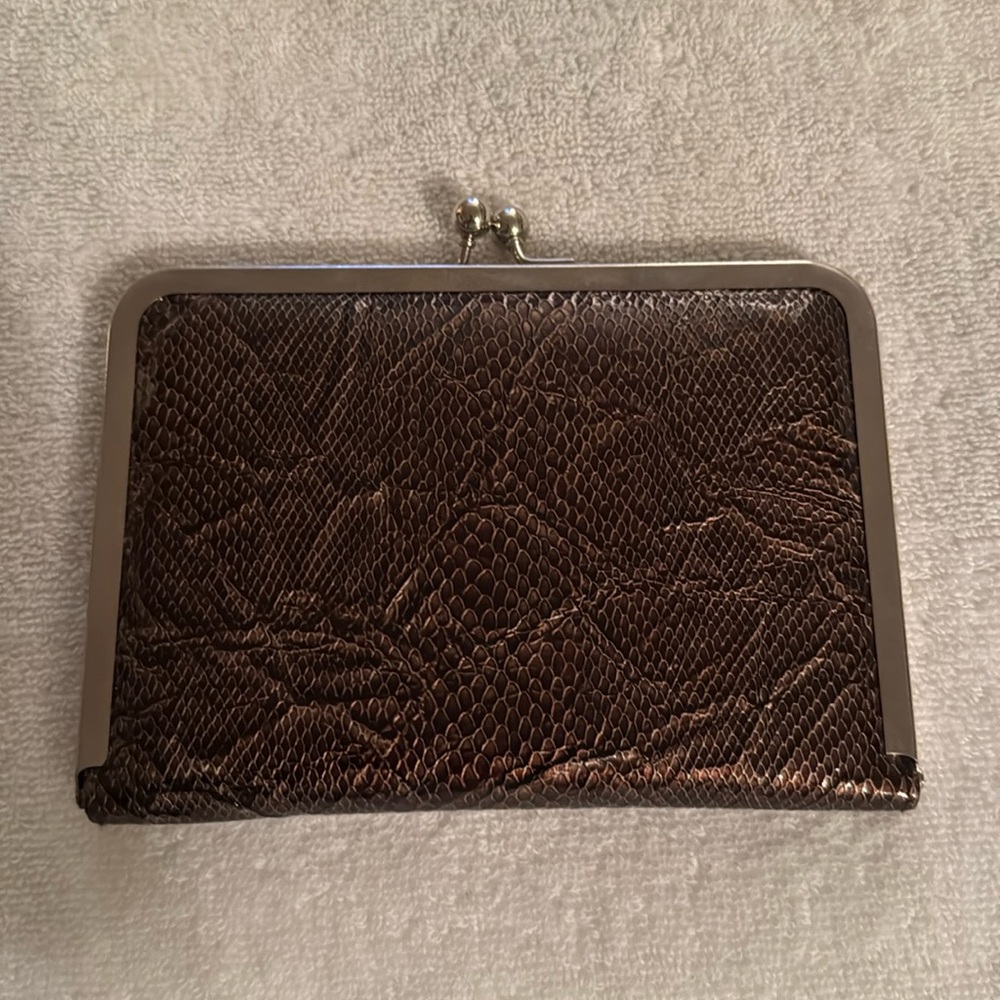 Small wallet, color brown in good condition almost like new